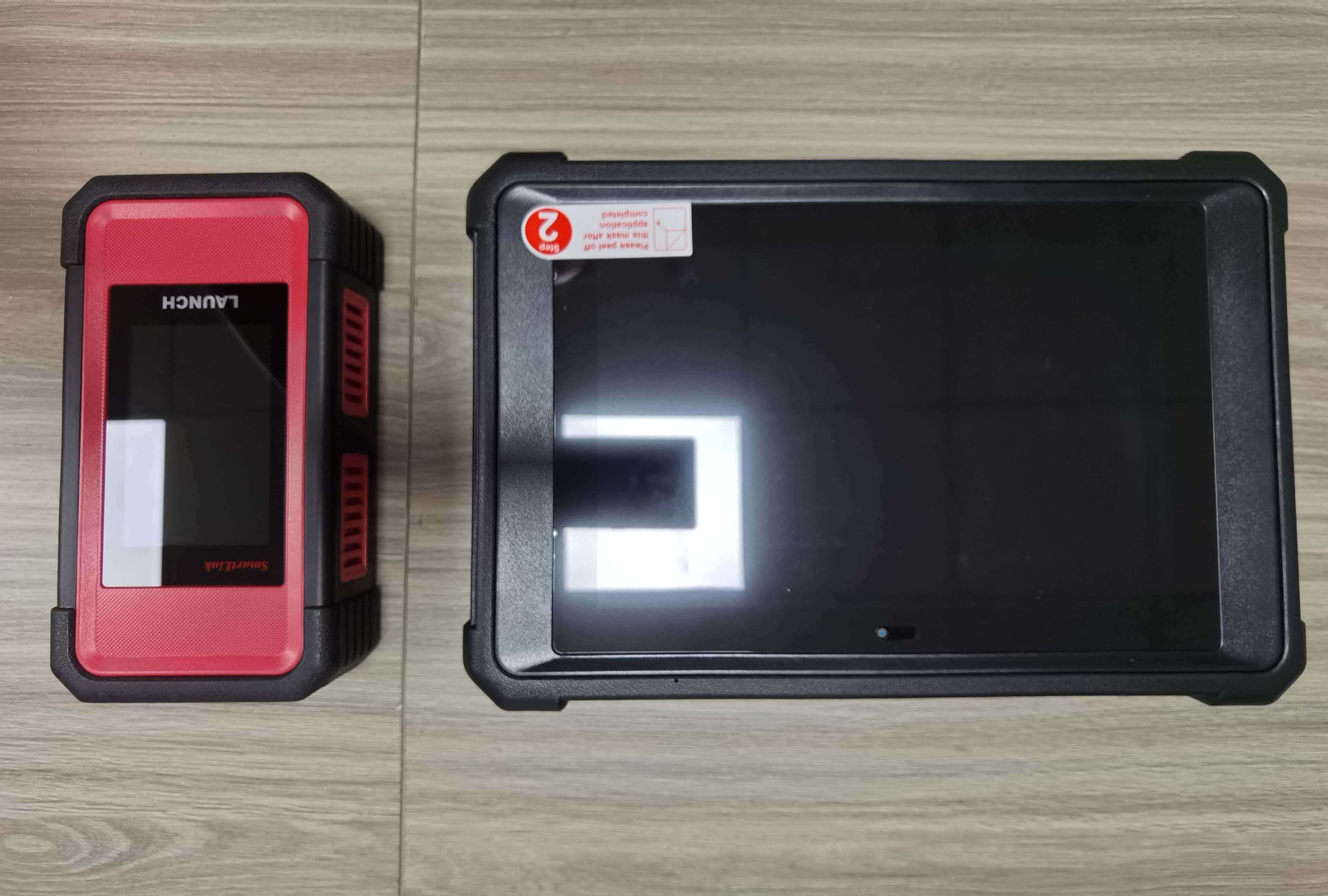 Side-by-side comparison: SmartLink C remote diagnostic device (left) and Chery OEM diagnostic platform X-431 PAD5 CHERY (right) - the two-tier diagnostic strategy hardware