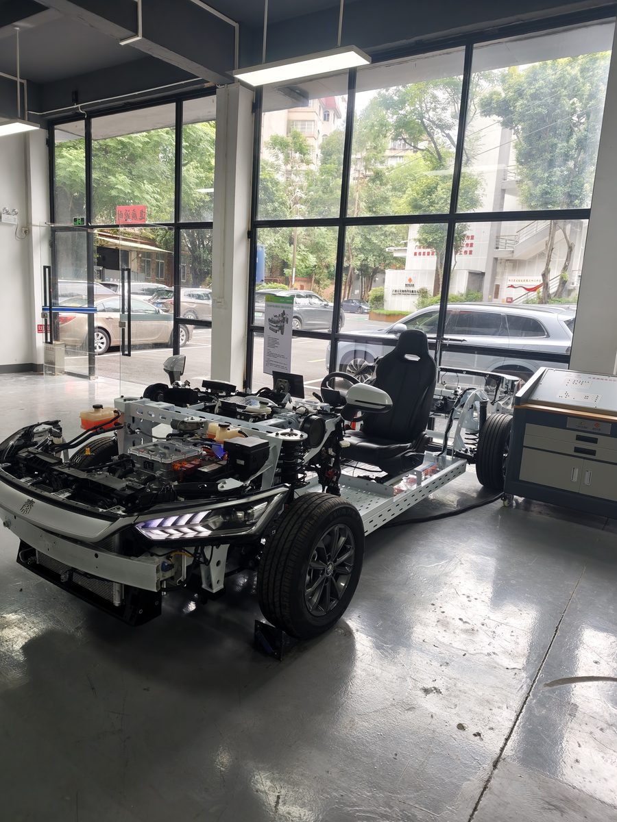 EV chassis and battery pack structure exposed for training demonstration