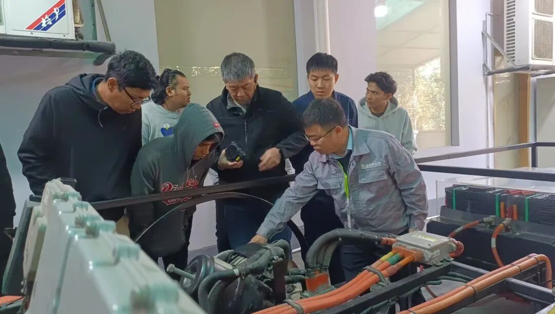 Hands-on EV high-voltage battery system training with certified Chinese engineers
