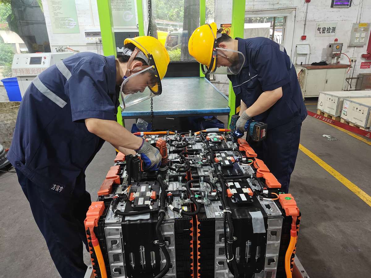 Vehicle disassembly practice at Guangzhou training facility